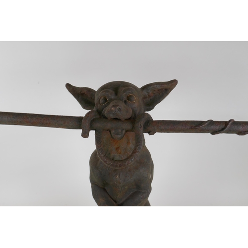 1088 - A Victorian cast iron stick stand formed as a dog on its hind legs, after Coalbrookdale, losses, 55c... 