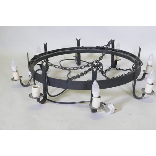 1096 - A wrought iron pendant ceiling light with eight branches, 96cm diameter