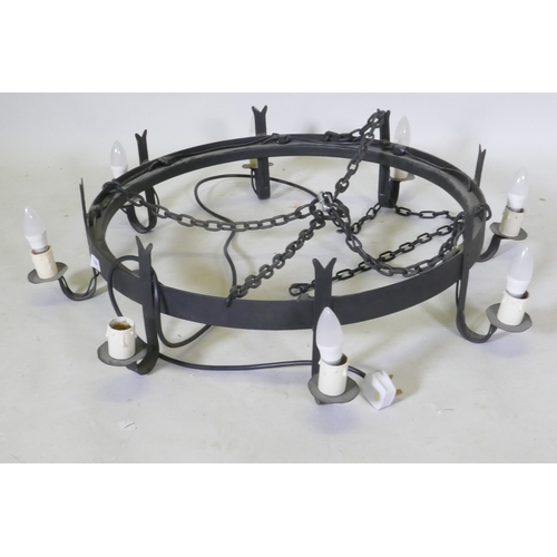 1096 - A wrought iron pendant ceiling light with eight branches, 96cm diameter