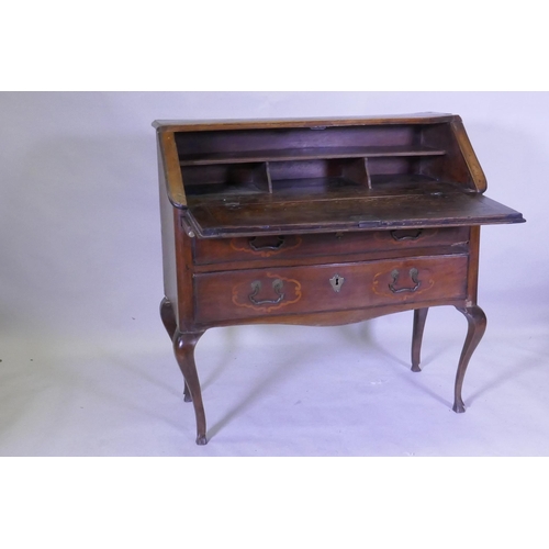 1097 - A late C18th/early C19th French Provincial fruitwood and walnut fall front bureau with inlaid decora... 