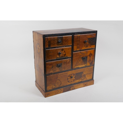 11 - A Japanese Meiji Yosegi-Zaiku marquetry jewellery cabinet of six drawers, 30 x 14cm, 31cm high