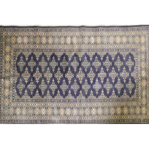 1101 - A Persian Sarugh blue ground wool rug, 150 x 92cm