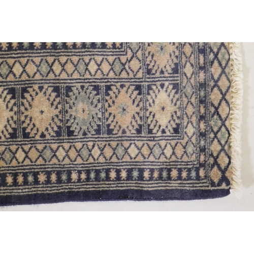 1101 - A Persian Sarugh blue ground wool rug, 150 x 92cm