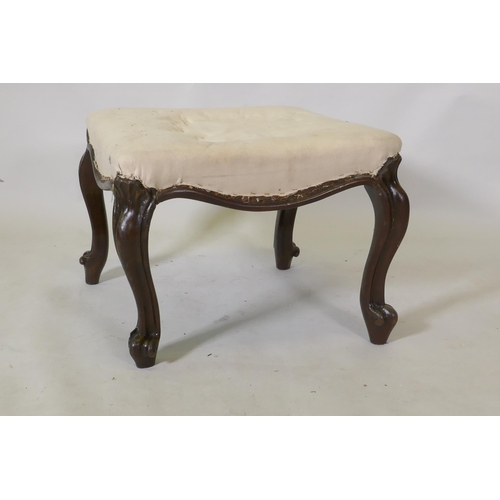 1110 - An early C19th rosewood footstool, raised on carved cabriole supports