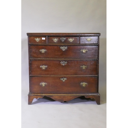 1140 - An early C18th oak chest of three over three drawers, with scratched and moulded detail on the rails... 