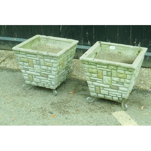 1150 - Two pairs of concrete planters, largest 38cm high