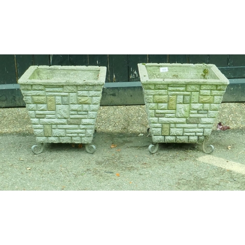 1150 - Two pairs of concrete planters, largest 38cm high