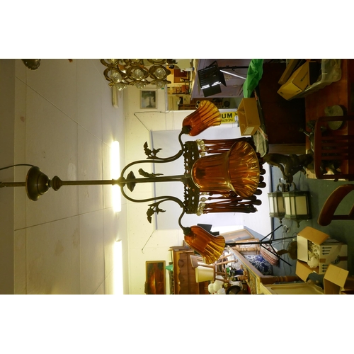 1155 - An early C19th continental pendant ceiling light with three branches and amber glass drops and shade... 