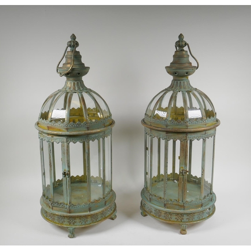 117 - A pair of domed topped metal lanterns with distressed gilt and ver de gris patina, 60cm high