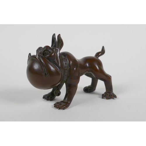 120 - An oriental bronze caricature bulldog, mark to base, 8cm long