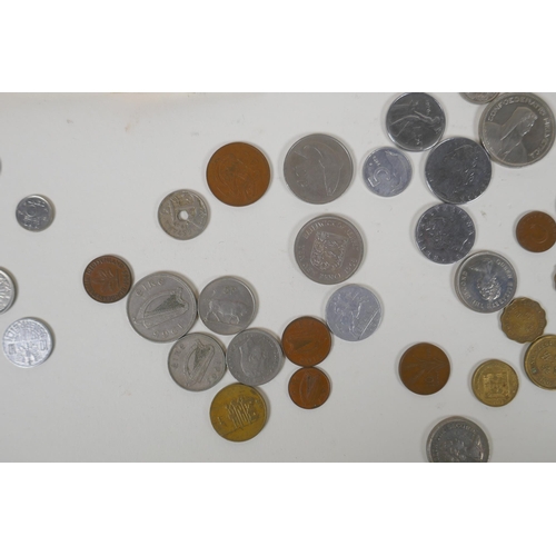 132 - A quantity of vintage world coinage and bank notes, including pre-Euro