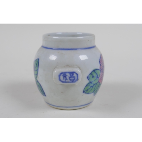 133 - A Chinese porcelain bird feeder with floral decoration, 2 character mark to handle, 7cm high