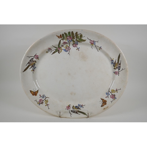 136 - A large Victorian meat dish with transfer printed decoration of birds amongst flower and ferns, mark... 