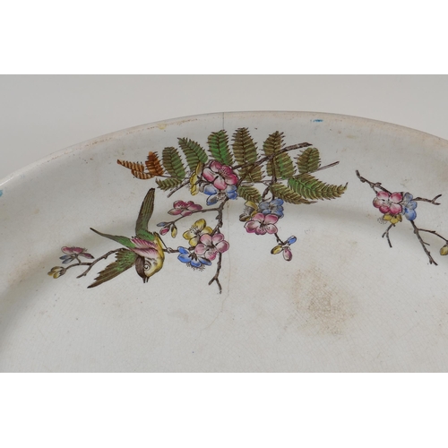 136 - A large Victorian meat dish with transfer printed decoration of birds amongst flower and ferns, mark... 