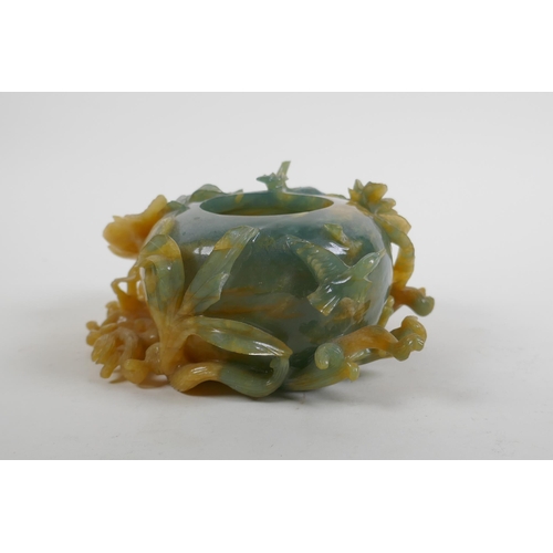 158 - A Chinese bi colour jade pot decorated with birds and lotus flowers, AF, 16cm wide