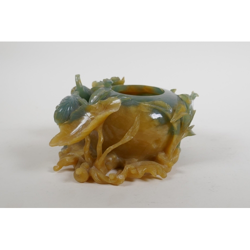 158 - A Chinese bi colour jade pot decorated with birds and lotus flowers, AF, 16cm wide