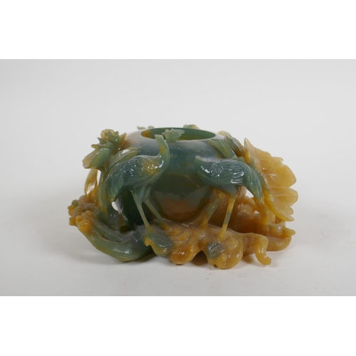 158 - A Chinese bi colour jade pot decorated with birds and lotus flowers, AF, 16cm wide