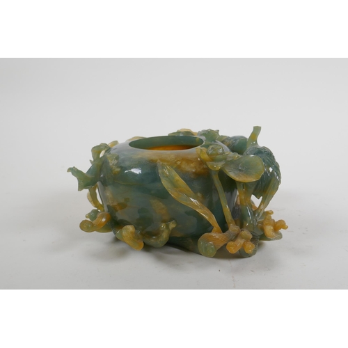 158 - A Chinese bi colour jade pot decorated with birds and lotus flowers, AF, 16cm wide