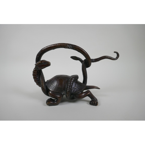 161 - A Chinese filled bronzed metal tortoise entwined with a snake, 26cm long, 17cm high