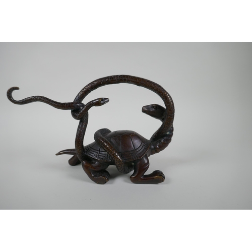 161 - A Chinese filled bronzed metal tortoise entwined with a snake, 26cm long, 17cm high