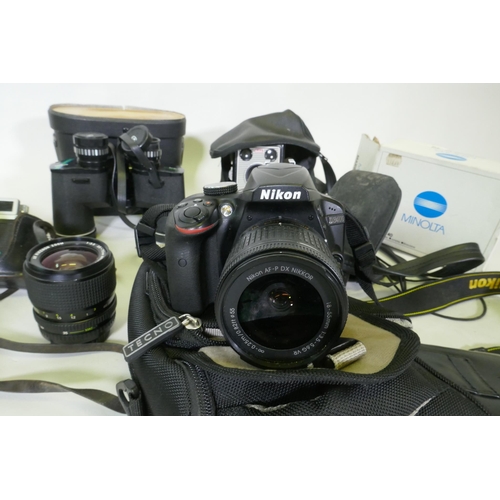 164 - A Nikon D3400 digital camera, a Ricoh KR-10X SLR 35mm camera, Kodak Brownie flash II, Fuji Finepix J... 