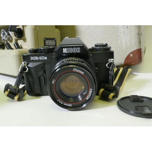 164 - A Nikon D3400 digital camera, a Ricoh KR-10X SLR 35mm camera, Kodak Brownie flash II, Fuji Finepix J... 