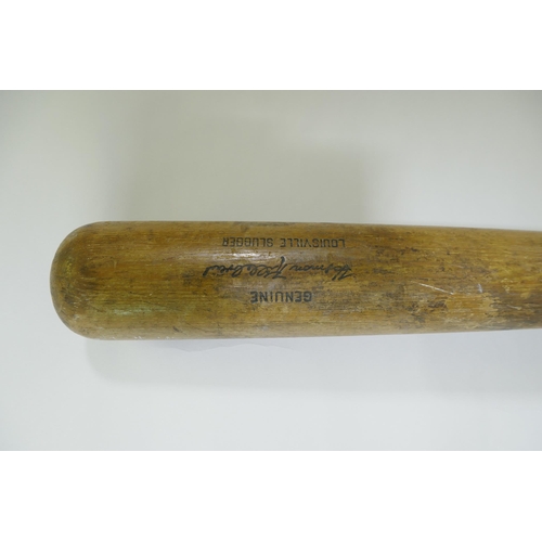 167 - A genuine 'Louisville Slugger' baseball bat, No 125, Hillerich and Bradsby Co, Louisville, KY