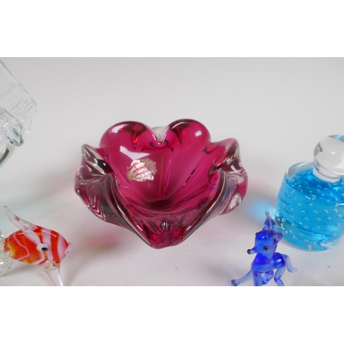 175 - A quantity of Murano glass animals, two ash trays and a paperweight, AF, largest 23cm long