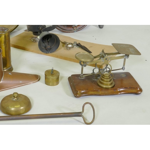 178 - A quantity of copper and brass, footman skillets, candlesticks, bed warmers, set of postage scales w... 