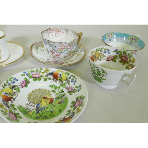 183 - Two Doulton figures, The Last Waltz, and various Staffordshire tea cups and saucers including Lowest... 