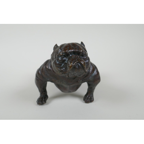 185 - A filled bronze figure of a bulldog, 19cm long