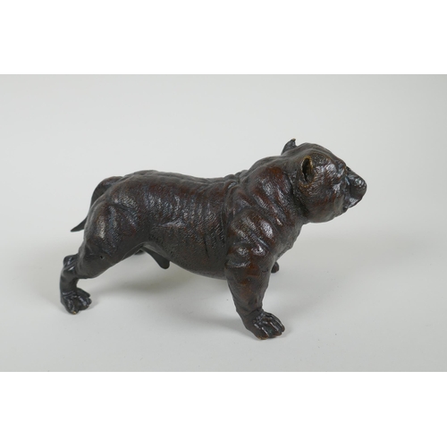 185 - A filled bronze figure of a bulldog, 19cm long