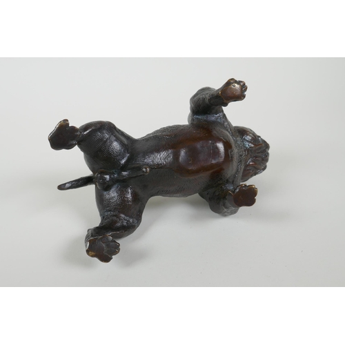 185 - A filled bronze figure of a bulldog, 19cm long