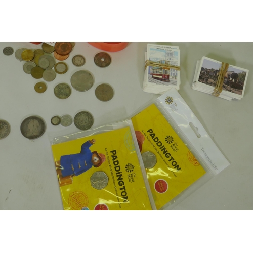 192 - A quantity of UK and world coins, costume jewellery, stamps, cigarette cards, watches, Omega stop wa... 