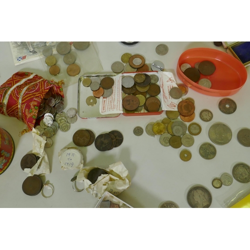 192 - A quantity of UK and world coins, costume jewellery, stamps, cigarette cards, watches, Omega stop wa... 