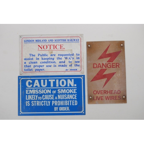 212 - Three vintage rail signs, Danger: Overhead Live Wires, Caution: Emissions of Smoke, and a W.C. Notic... 