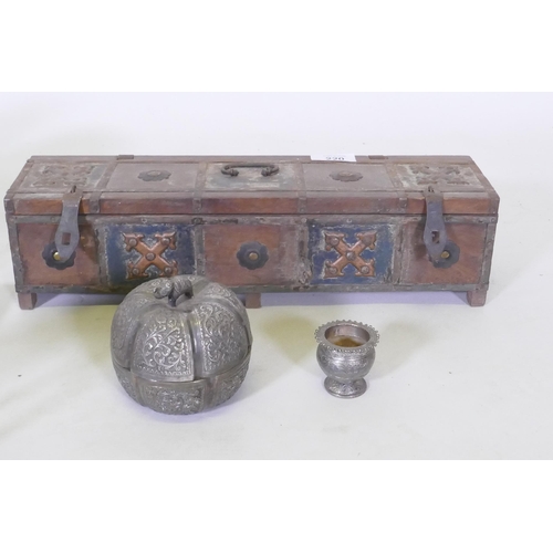 220 - An Indian wood and metal mounted candle box, white metal pot and cover, a pair of bronzed metal figu... 