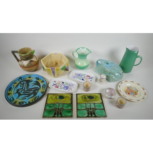 228 - A quantity of assorted pottery to include a mottled green glazed Sadler Racing Car teapot, a Bretby ... 