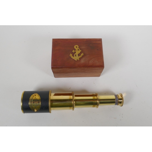 229 - A reproduction commemorative brass four draw telescope for The Flying Scotsman reaching 100mph, 39cm... 