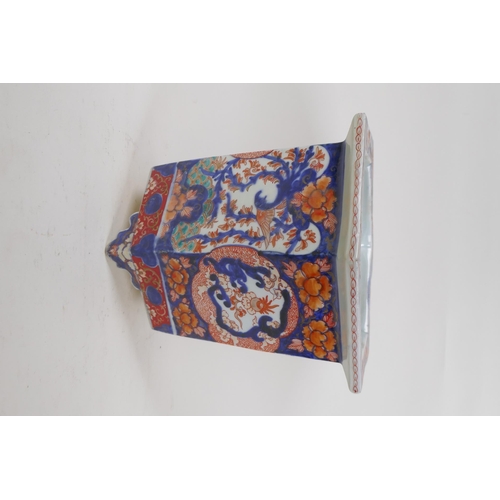 23 - A C19th Chinese Imari porcelain planter of hexagonal form, with phoenix and floral decorative panels... 