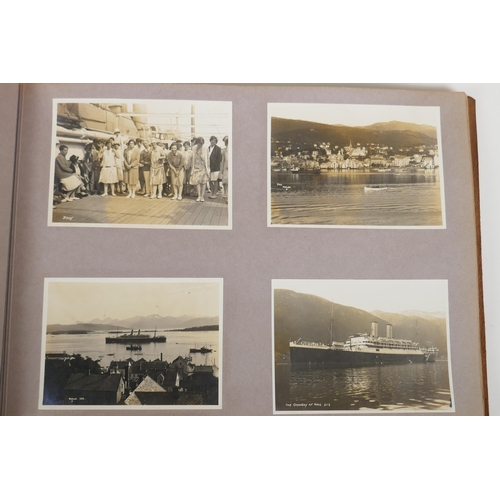 236 - A collection of items relating to early C20th cruises of Norway including an album of photographs of... 