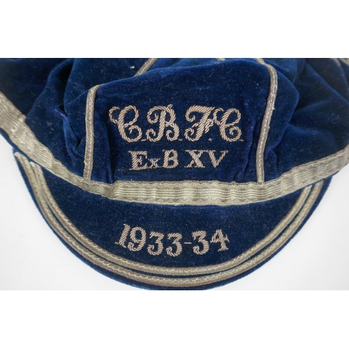 26 - A pre WWII Rugby Union blue velvet cap for the 1933-34 season, with silver embroidered club initials... 