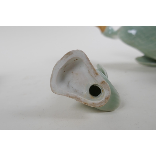 261 - A pair of Chinese celadon glazed porcelain ducks with impressed seal mark to base, and another small... 