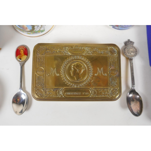 264 - A Princess Mary Christmas 1914 gift tin, together with two commemorative china cups, tea spoons, a 1... 