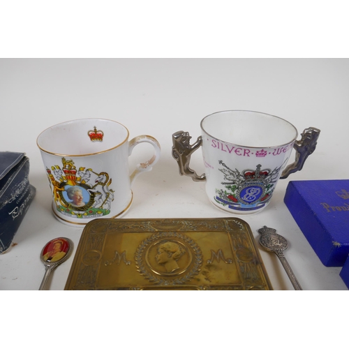 264 - A Princess Mary Christmas 1914 gift tin, together with two commemorative china cups, tea spoons, a 1... 