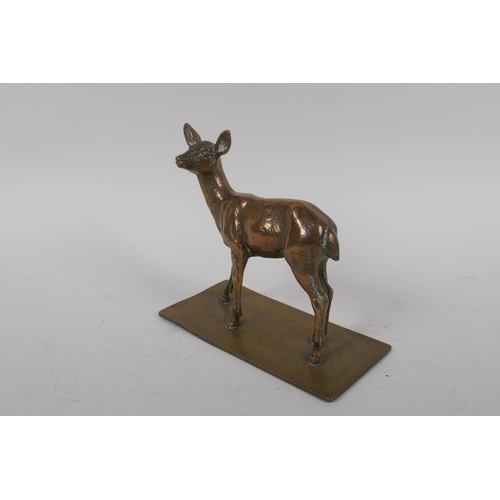 278 - An antique bronze figure of a deer, 16cm high