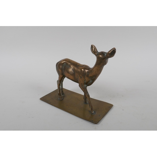 278 - An antique bronze figure of a deer, 16cm high