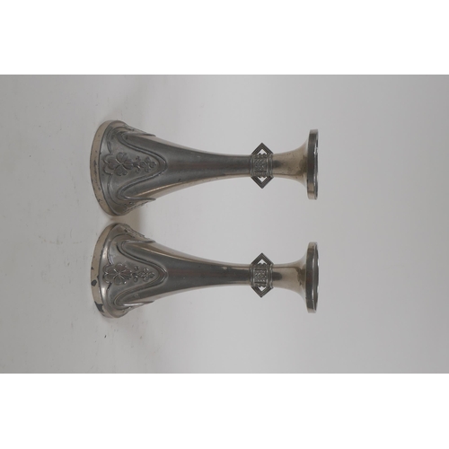 283 - A pair of Jugendstil white metal spill vases, 15cm high