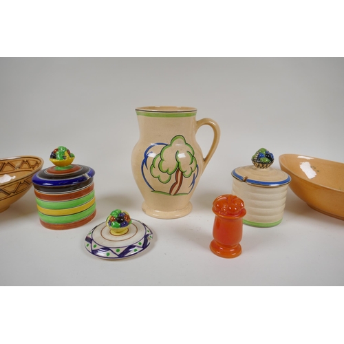 29 - Six assorted pieces of Ashtead Pottery to include a jug, (J16), two sugar pots and covers, (X13), tw... 