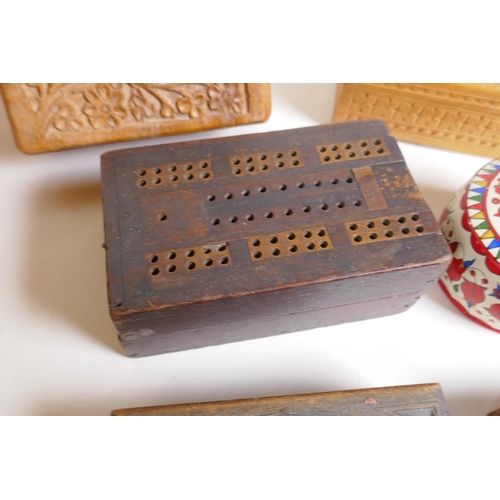 292 - A quantity of assorted wooden boxes including three Sadeli, cribbage and carved boxes, together with... 